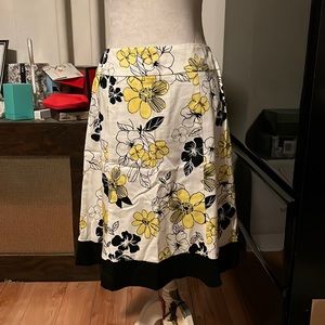 Dress barn size 10 midi skirt white with black trim and yellow flowers
